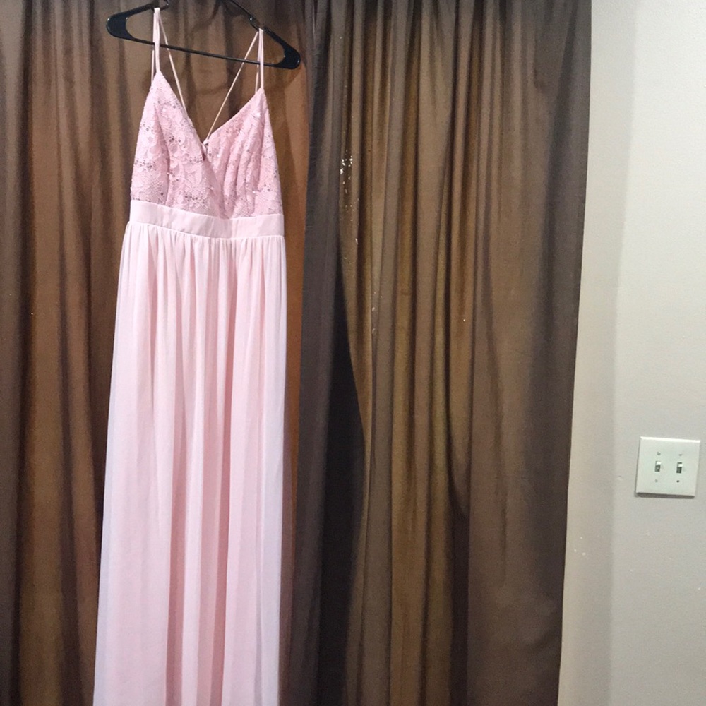 Long, silky dress with a sequined top